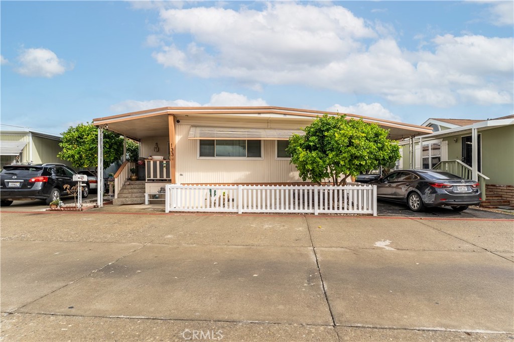 133 Colombo Lane Tustin, CA 92780 - Photo 2 of 26 a view of a car garage of the house