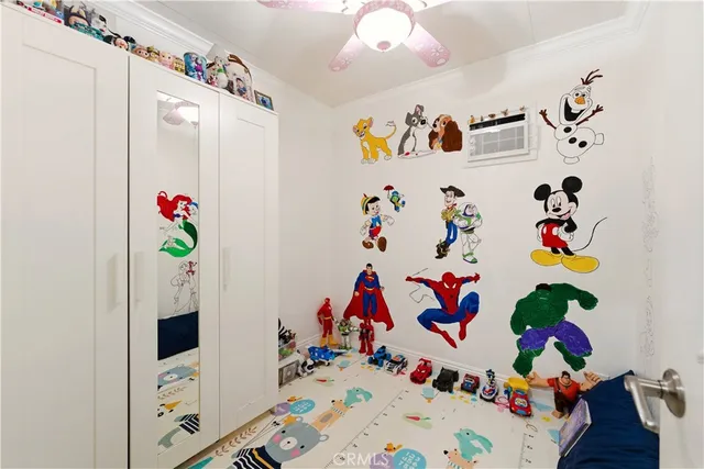 a bedroom with a bed and a table in it