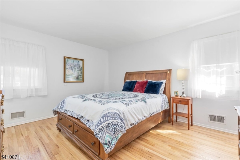 11 Dorr Road New Providence, NJ 07974 - Photo 11 of 28 a bedroom with a bed and window