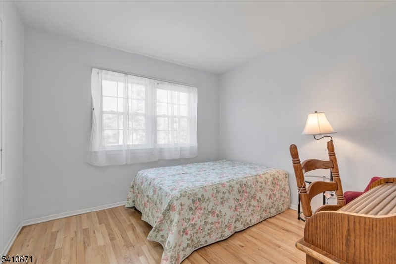 11 Dorr Road New Providence, NJ 07974 - Photo 13 of 28 a bedroom with bed and window