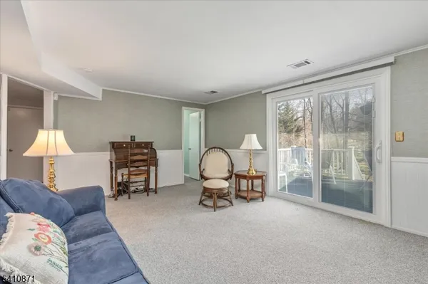 a bedroom with a bed and a yard