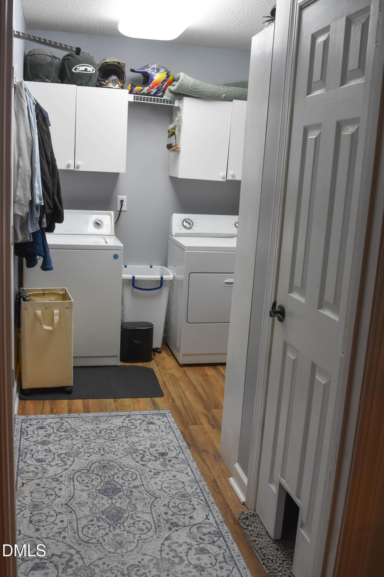 5908 Deep Spring Circle Wake Forest, NC 27587 - Photo 13 of 51 a utility room with dryer and washer
