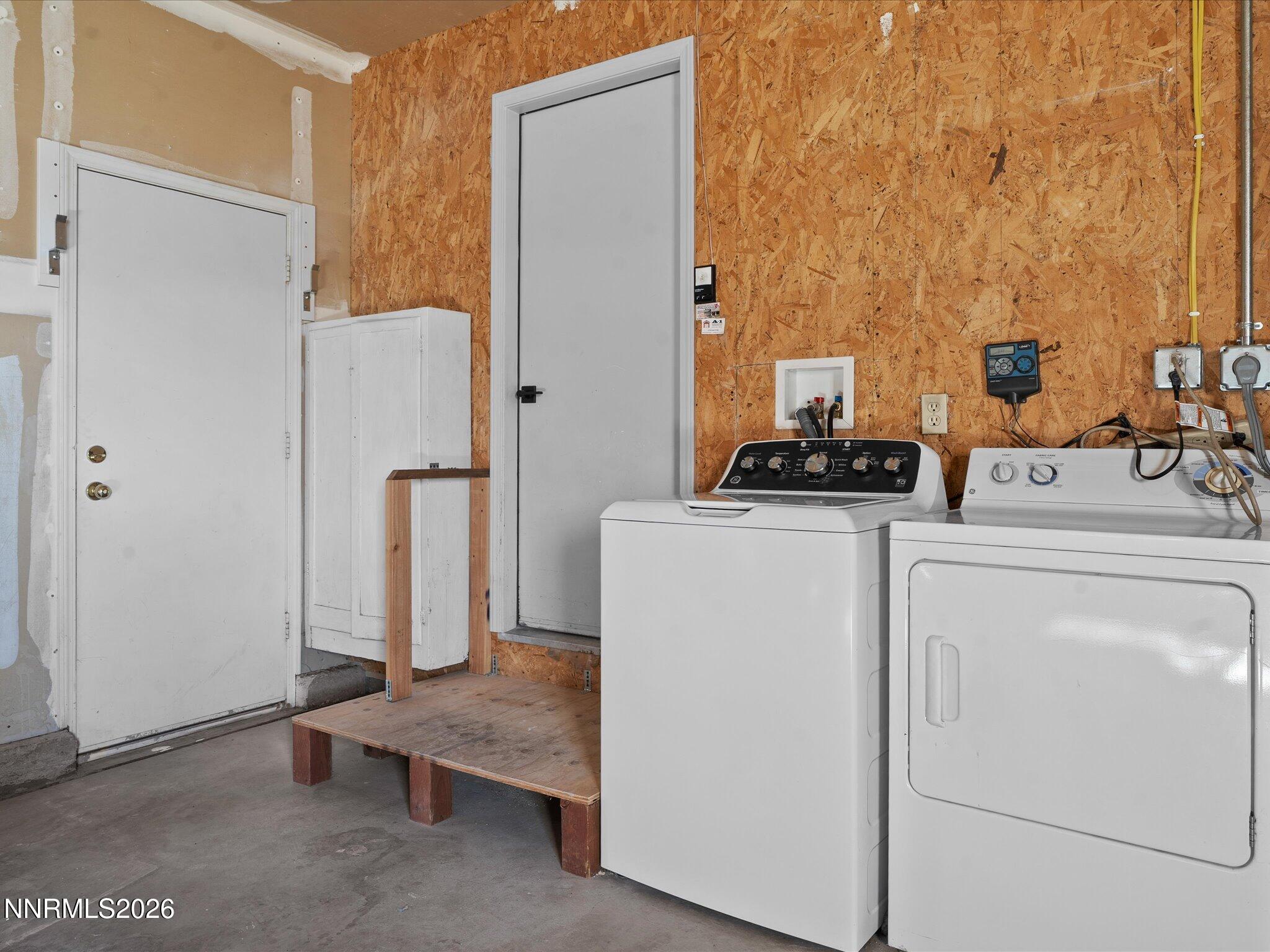 3549 Shadow Lane Carson City, NV 89705 - Photo 23 of 32 a view of storage and utility room with washer and dryer