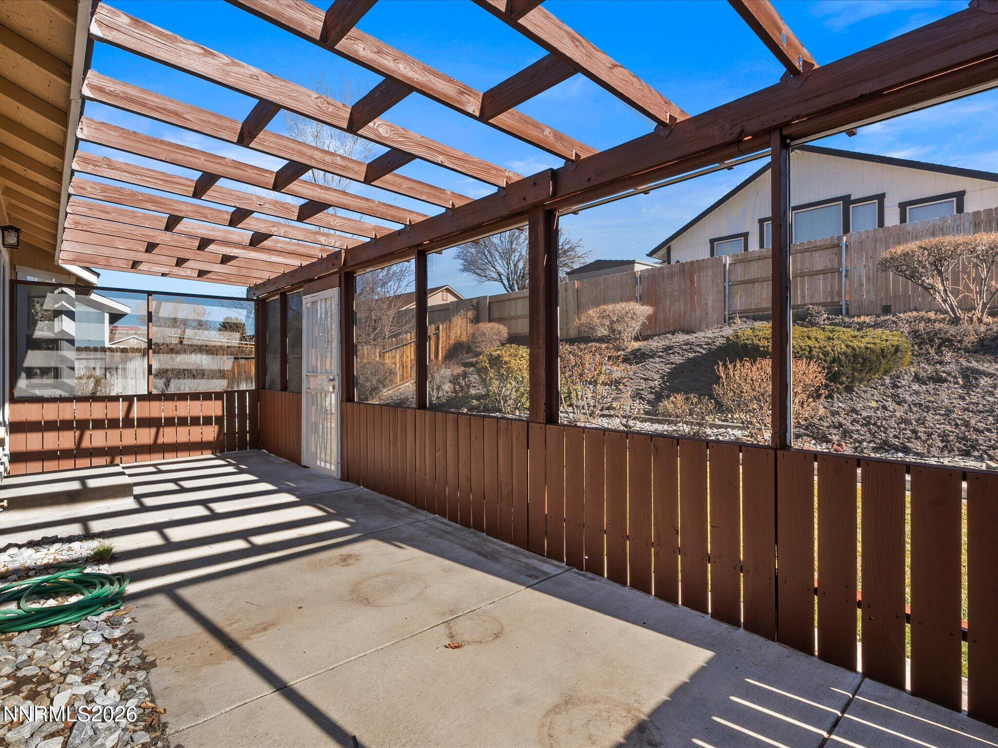 3549 Shadow Lane Carson City, NV 89705 - Photo 27 of 32 a balcony view with a backyard space