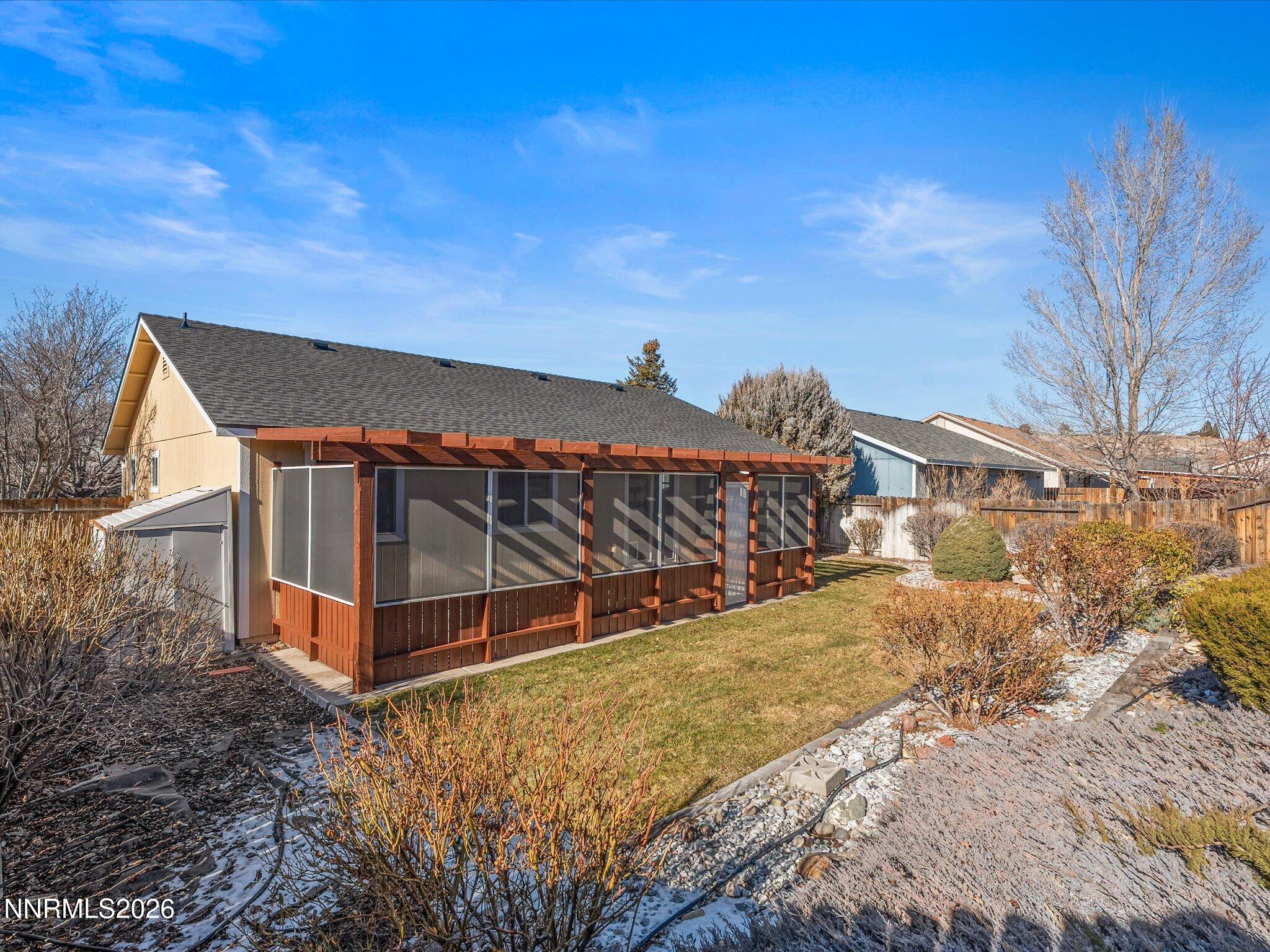 3549 Shadow Lane Carson City, NV 89705 - Photo 30 of 32 a view of a house with a yard