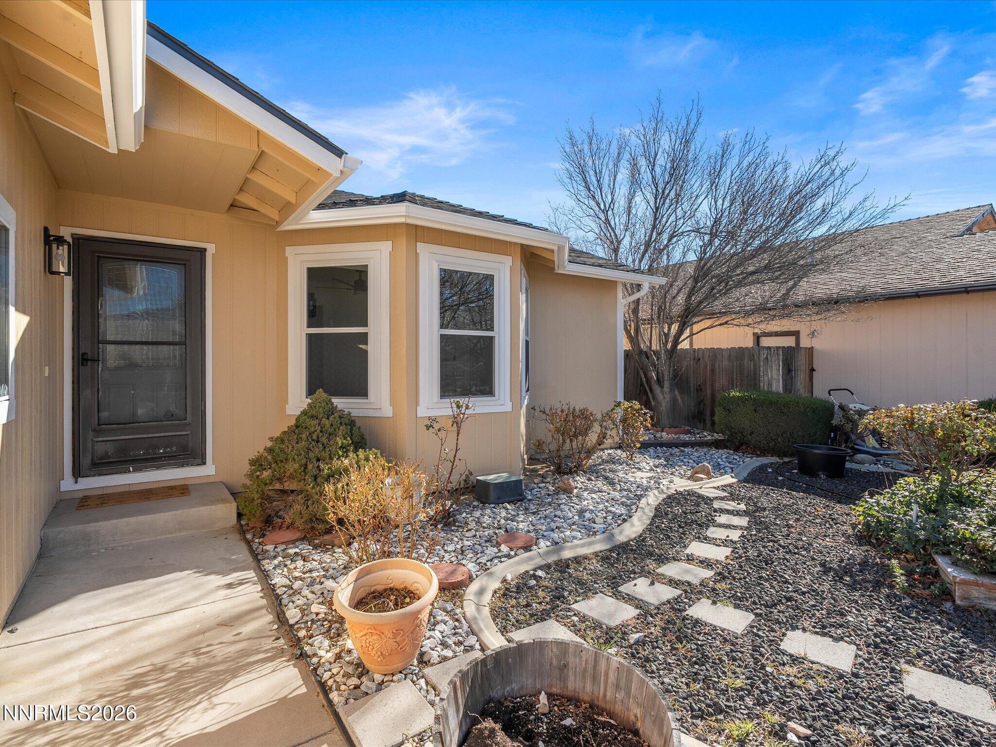 3549 Shadow Lane Carson City, NV 89705 - Photo 32 of 32 a backyard of a house with seating space