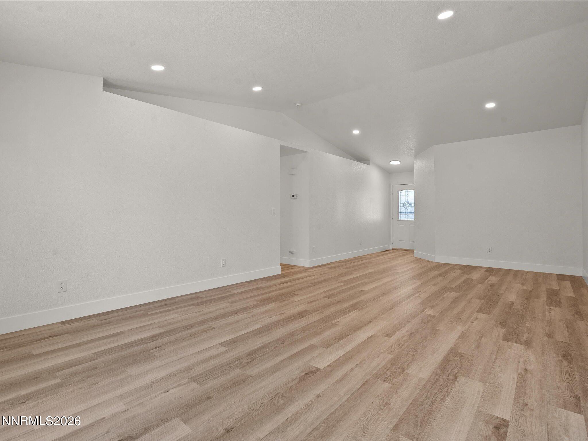 3549 Shadow Lane Carson City, NV 89705 - Photo 5 of 32 a view of empty room with wooden floor