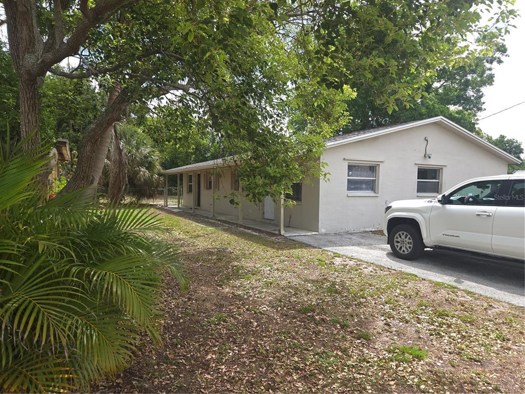 1741 Trotter Road, Unit A Largo, FL 33774 - Photo 1 of 9 a view of a house with a patio