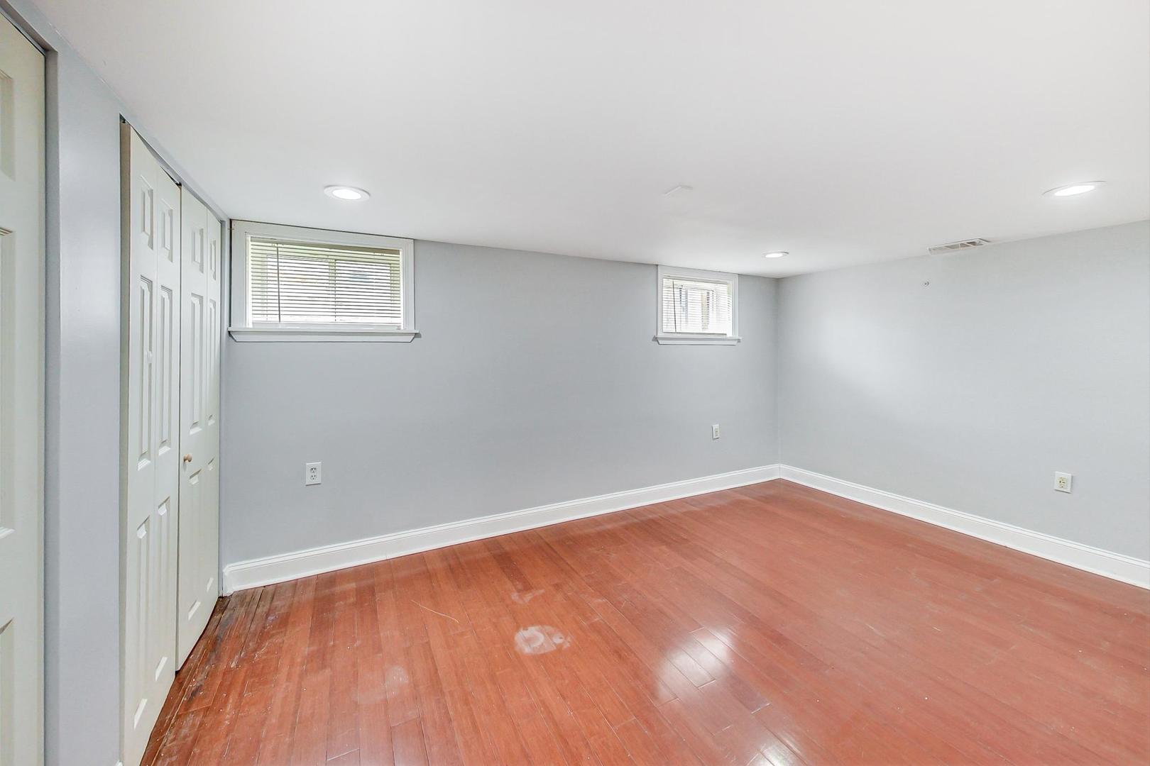402 North Main Street Mount Prospect, IL 60056 - Photo 15 of 19 a view of an empty room with wooden floor and a window