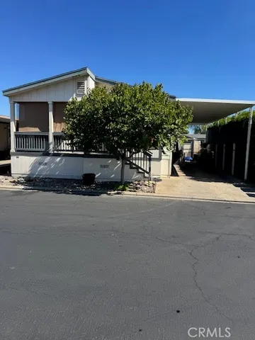 a view of a house with a street