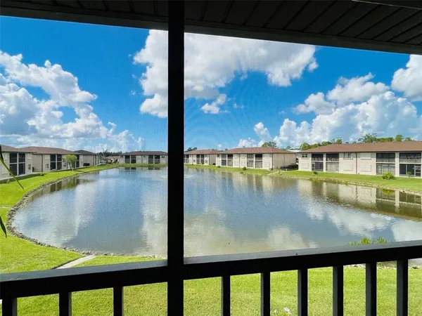a view of swimming pool from a balcony