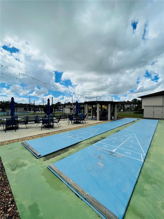 25100 Sandhill Boulevard, Unit Q201 Punta Gorda, FL 33983 - Photo 24 of 25 a view of a tennis court