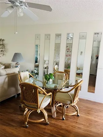 a workspace with furniture and wooden floor