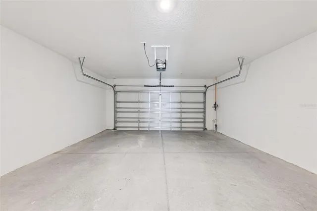 a view of an empty room with stairs