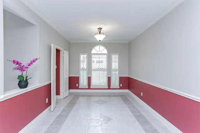 a view of an empty room and window