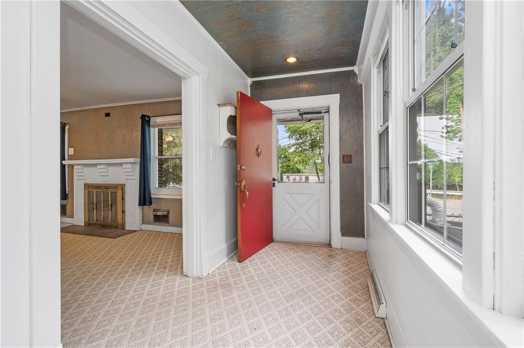 246 Olive Street Hunker, PA 15639 - Photo 4 of 27 a view of a hallway with furniture and a window