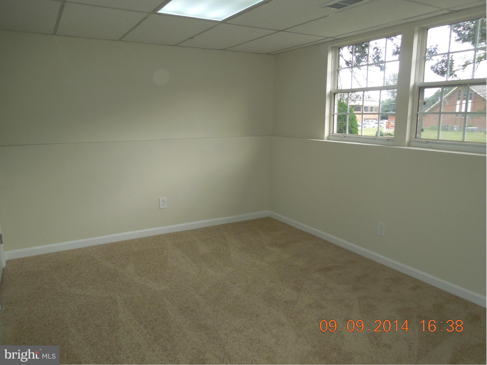 7030 Johnnycake Road Baltimore, MD 21228 - Photo 11 of 22 an empty room with a window