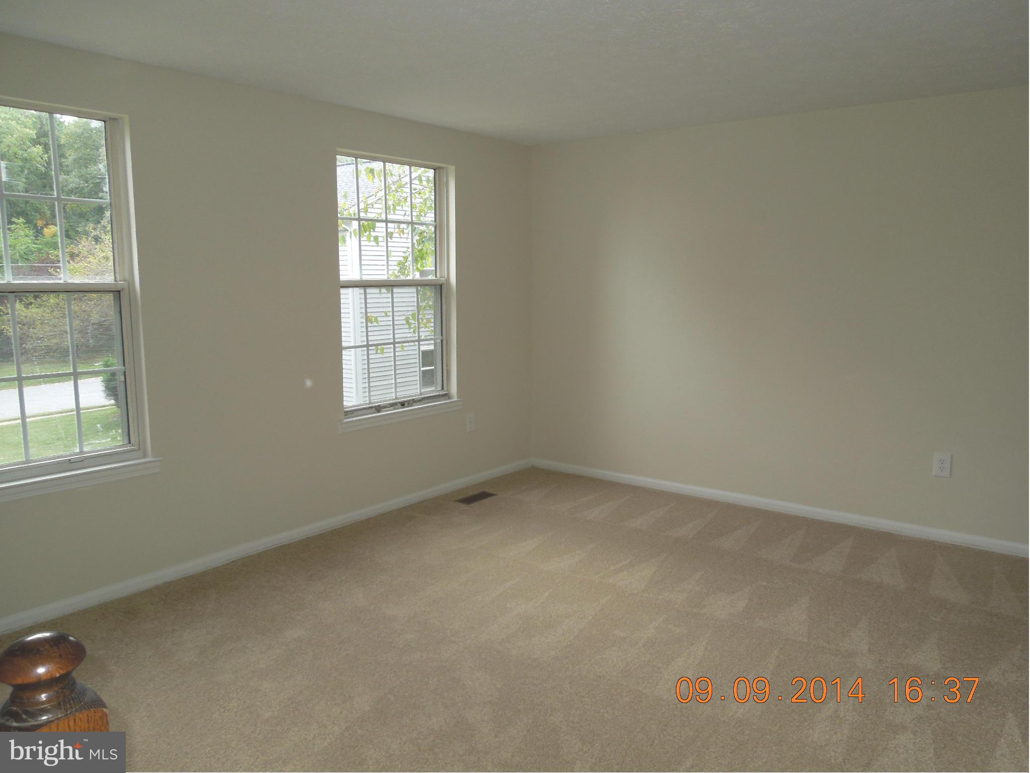 7030 Johnnycake Road Baltimore, MD 21228 - Photo 6 of 22 an empty room with a window