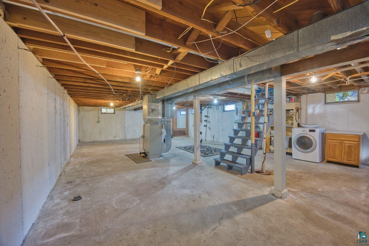 5316 Highway 110 Aurora, MN 55705 - Photo 17 of 35 Basement featuring washer / clothes dryer and heating unit