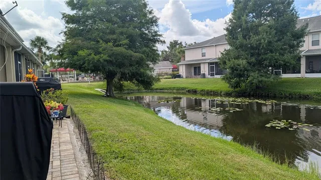 a backyard of a house with seating space