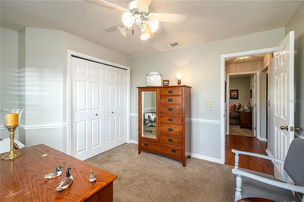 a workspace with furniture and window