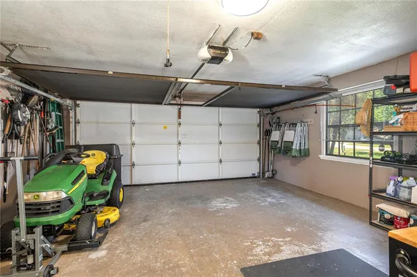 a view of a livingroom with furniture and a flat screen tv