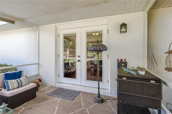 a view of yard with swimming pool and green space