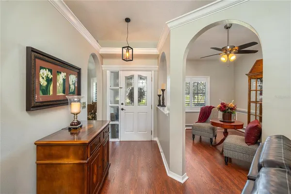 a room with furniture and wooden floor