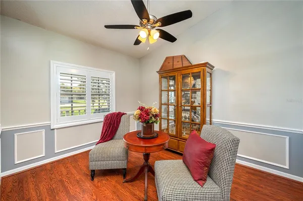 a living room with furniture and a window