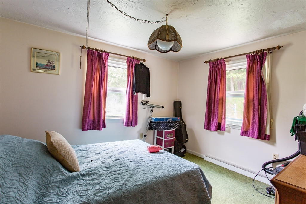 12 Hadley Path West Brookfield, MA 01585 - Photo 15 of 28 a bedroom with a bed and a window