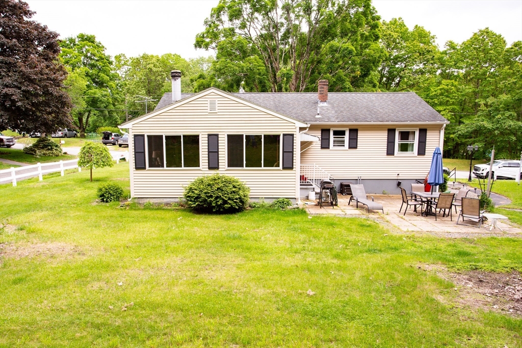 12 Hadley Path West Brookfield, MA 01585 - Photo 2 of 28 a front view of a house with swimming pool