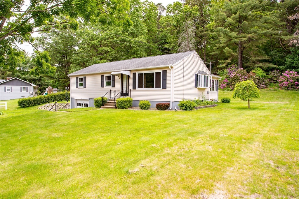 12 Hadley Path West Brookfield, MA 01585 - Photo 23 of 28 a view of a house with a yard