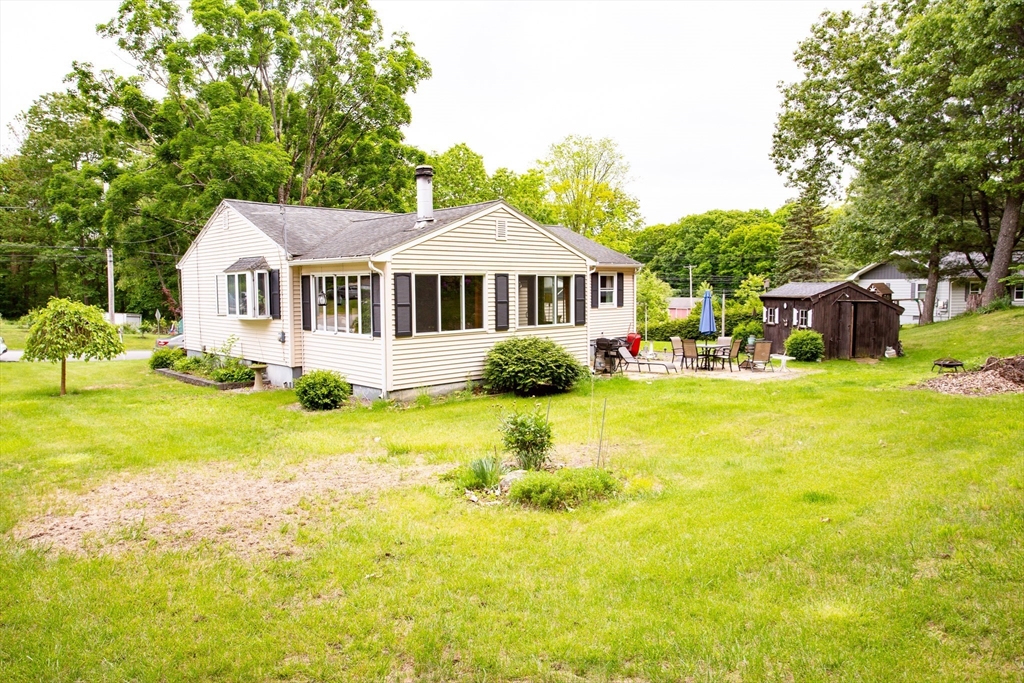12 Hadley Path West Brookfield, MA 01585 - Photo 24 of 28 a front view of a house with yard and green space