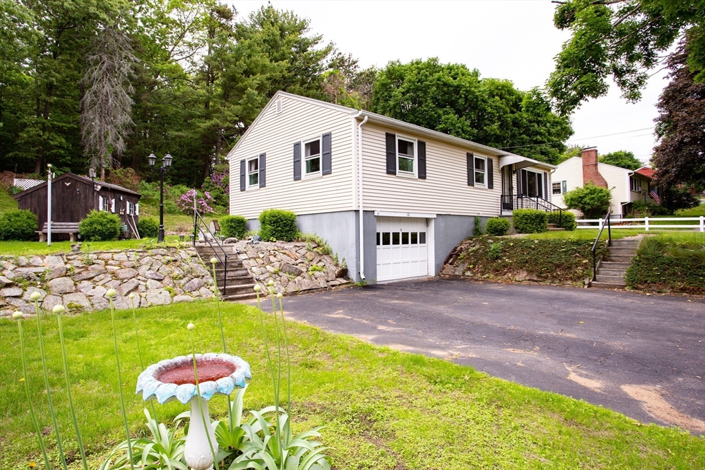 12 Hadley Path West Brookfield, MA 01585 - Photo 28 of 28 a view of a backyard with a garden and plants