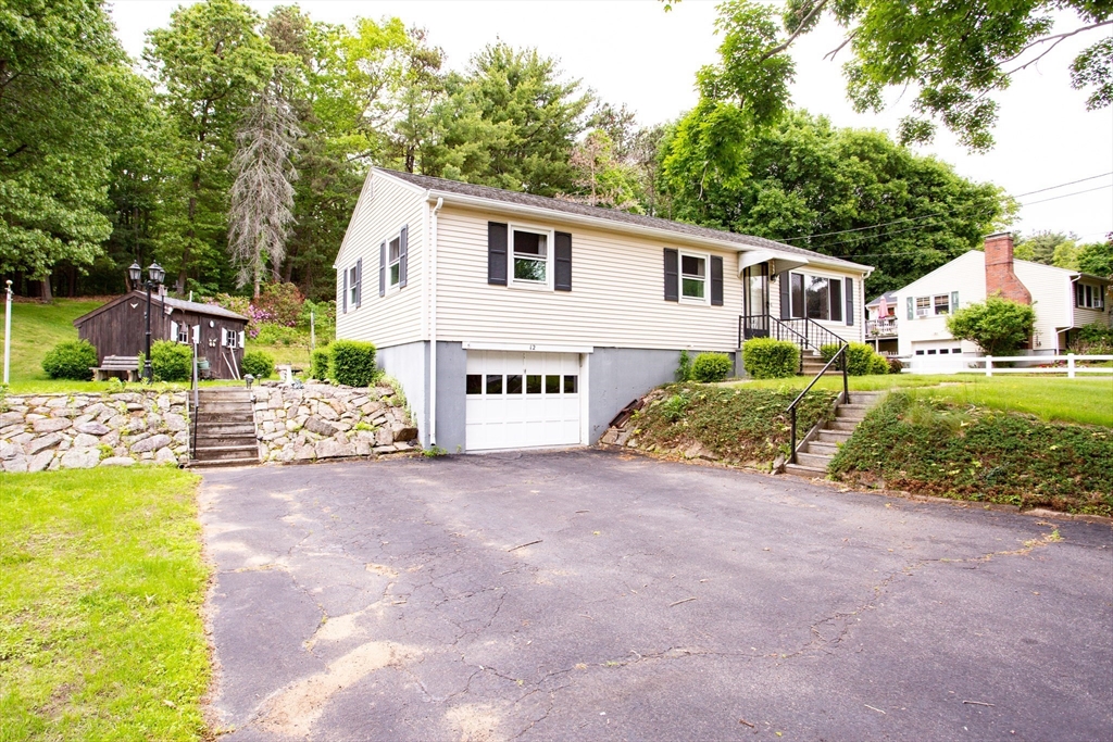 12 Hadley Path West Brookfield, MA 01585 - Photo 3 of 28 a view of a house with a yard and sitting area