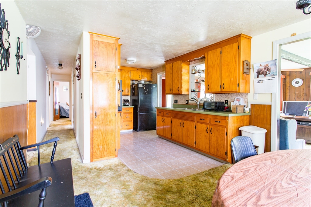 12 Hadley Path West Brookfield, MA 01585 - Photo 5 of 28 a bedroom with furniture and large windows