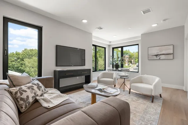 $995,000 | 249 Corey Road, Unit 306, Boston, MA 02135