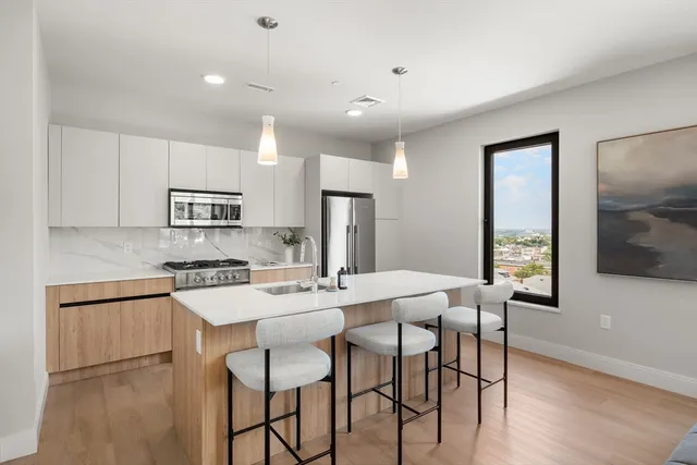 $995,000 | 249 Corey Road, Unit 306, Boston, MA 02135