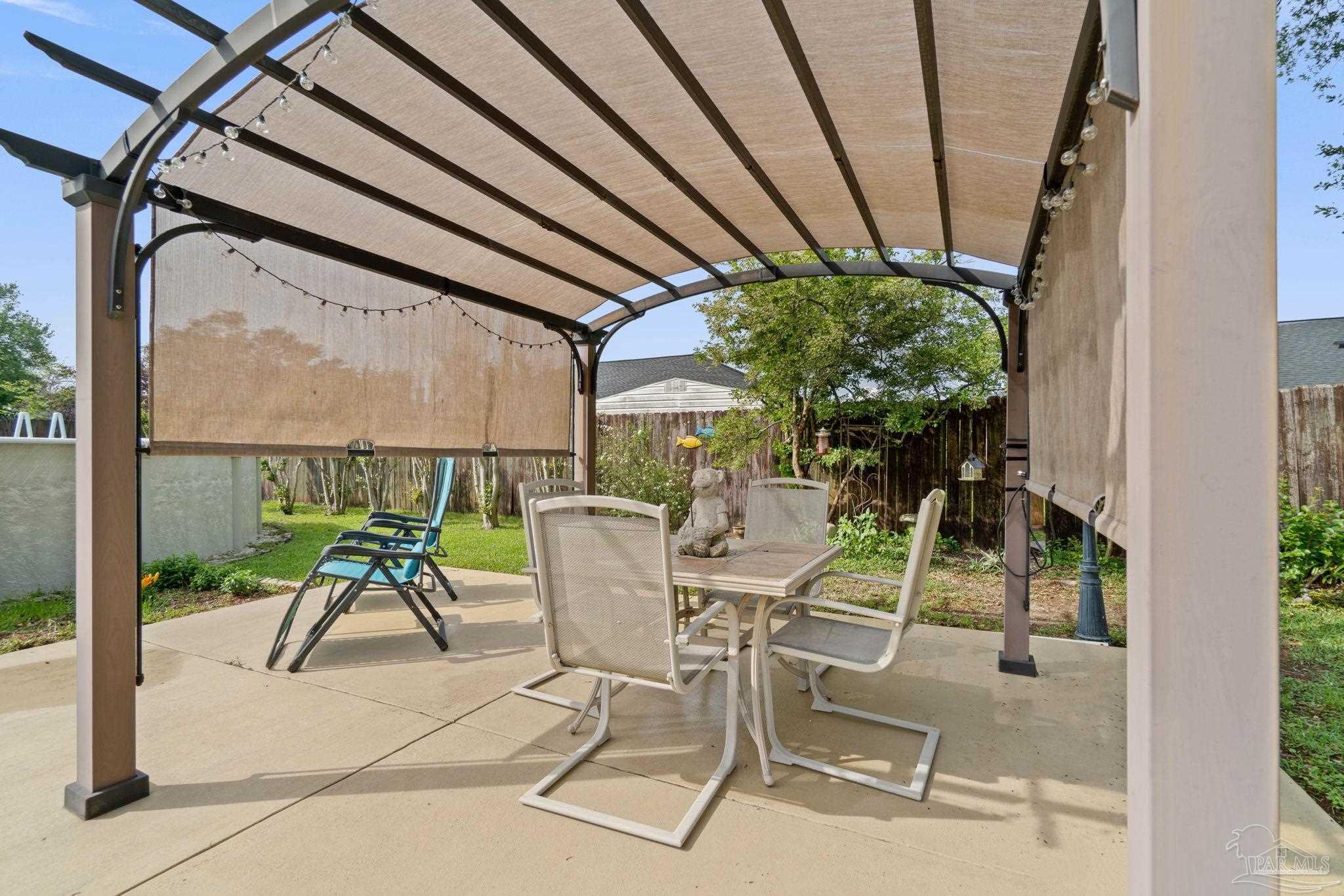 1342 Mazurek Boulevard Pensacola, FL 32514 - Photo 24 of 36 a view of a chairs and table in the patio