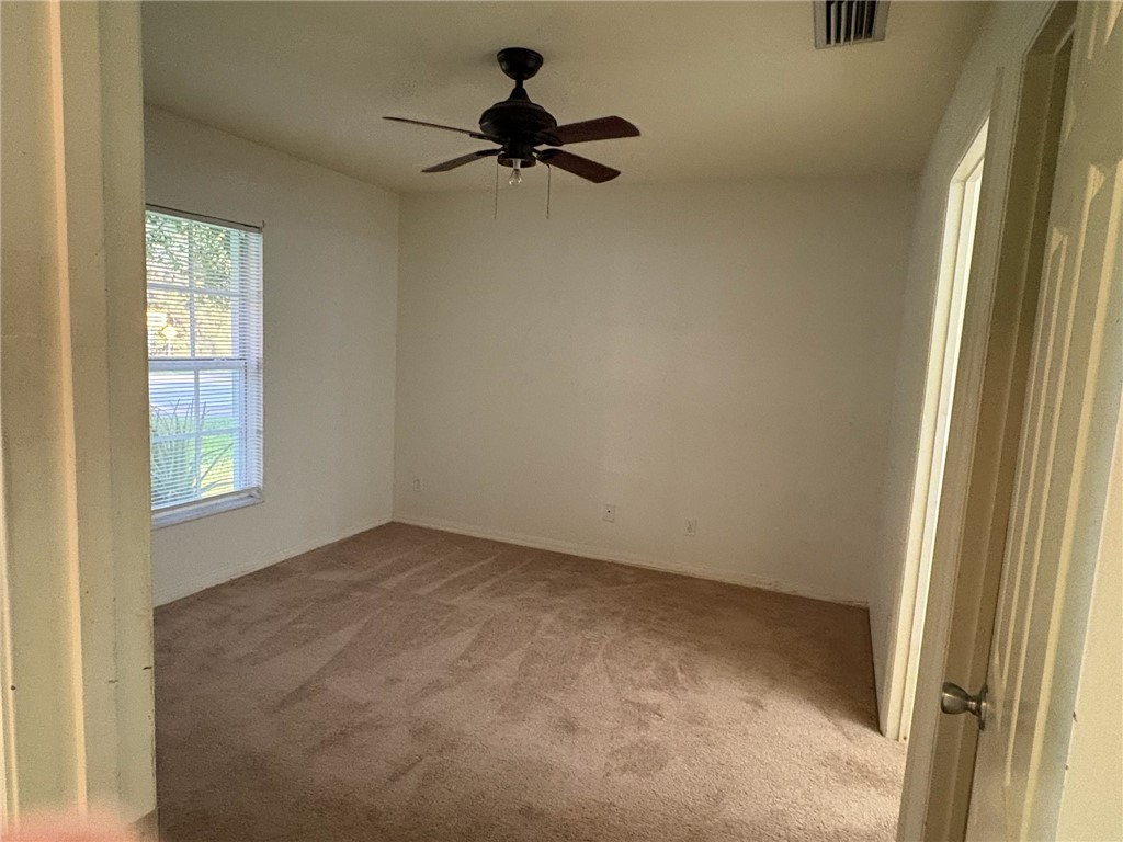 2380 90th Avenue Vero Beach, FL 32966 - Photo 3 of 8 a view of room with a window