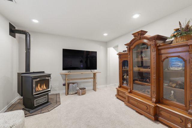 1888 East Cobblestone Road Springville, UT 84663 - Photo 37 of 44 Built-in wood-burning stove with a tile hearth and a visible exhaust pipe