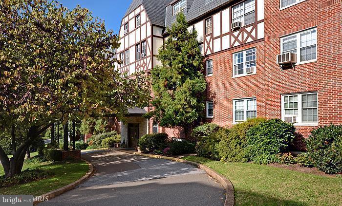 310 Ridgemede Road, Unit 206 Baltimore, MD 21210 - Photo 1 of 17 a front view of a house