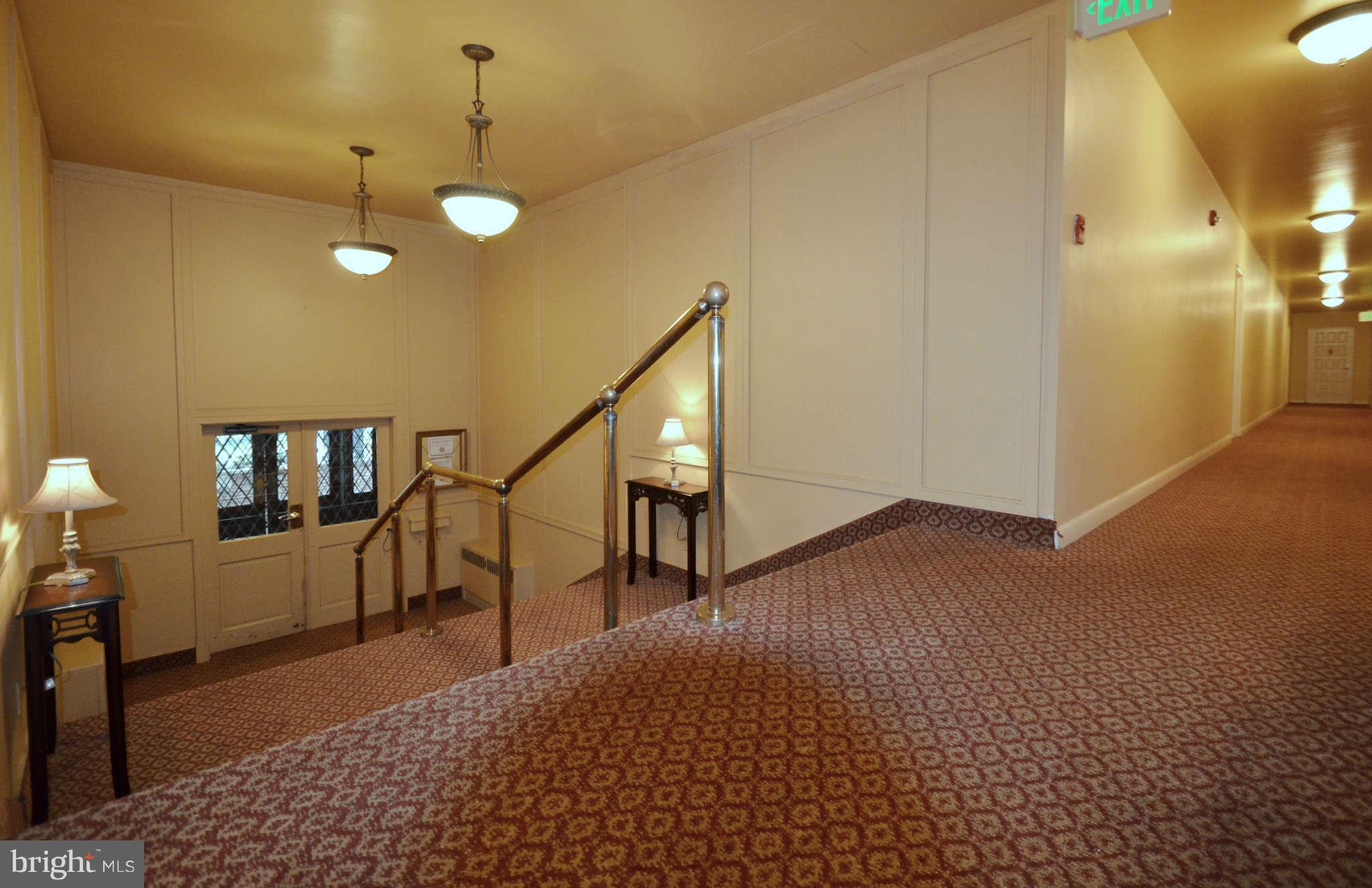 310 Ridgemede Road, Unit 206 Baltimore, MD 21210 - Photo 12 of 17 a view of entryway and hall with wooden floor