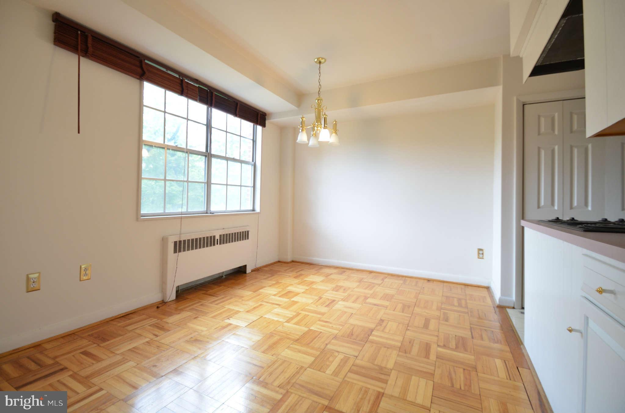 310 Ridgemede Road, Unit 206 Baltimore, MD 21210 - Photo 7 of 17 a view of an empty room with a window