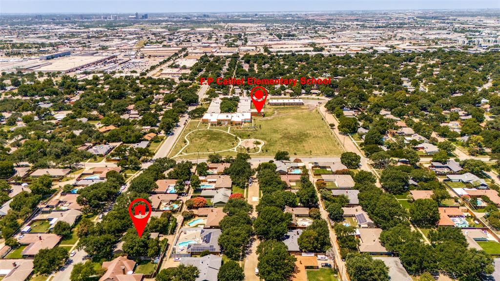 3151 Merrell Road Dallas, TX 75229 - Photo 25 of 25 Aerial overview of the neighborhood, highlighting residential properties and a nearby elementary school