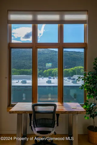a view of a wooden deck with a bench