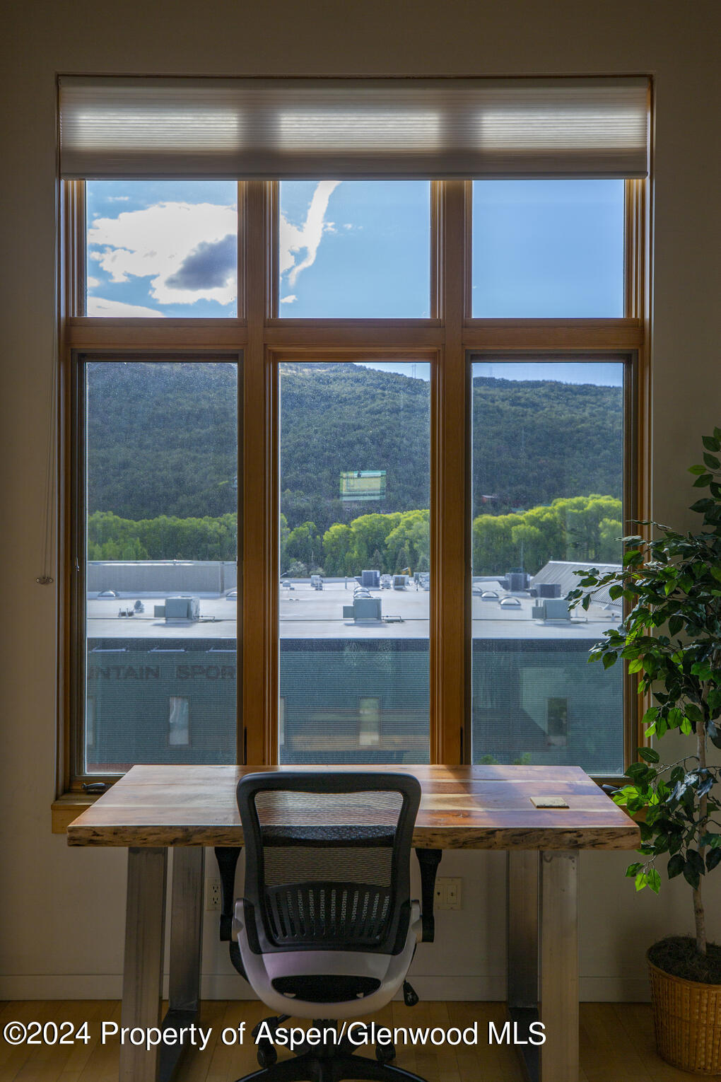 231 Robinson Street, Unit 330 Basalt, CO 81621 - Photo 13 of 45 a view of a wooden deck with a bench