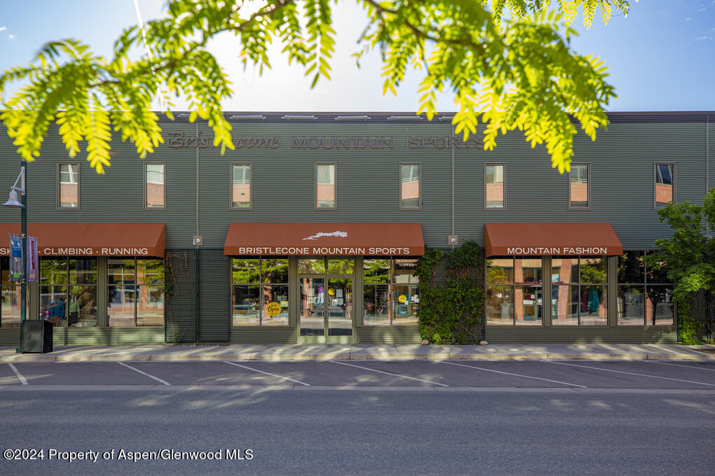 231 Robinson Street, Unit 330 Basalt, CO 81621 - Photo 35 of 45 a front view of a house with a garden