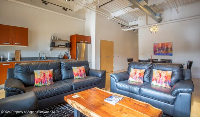 a living room with furniture and a couch