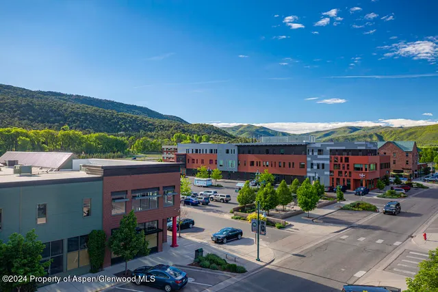 a sign board with a yard